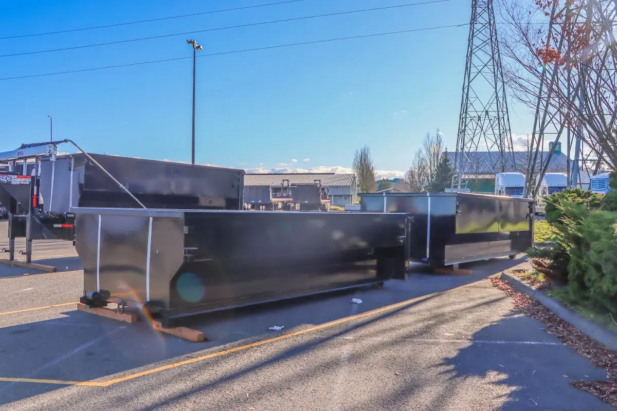 Roll-off dumpster ready for waste disposal at job site for Concrete Dumpster Rental in Lakehills